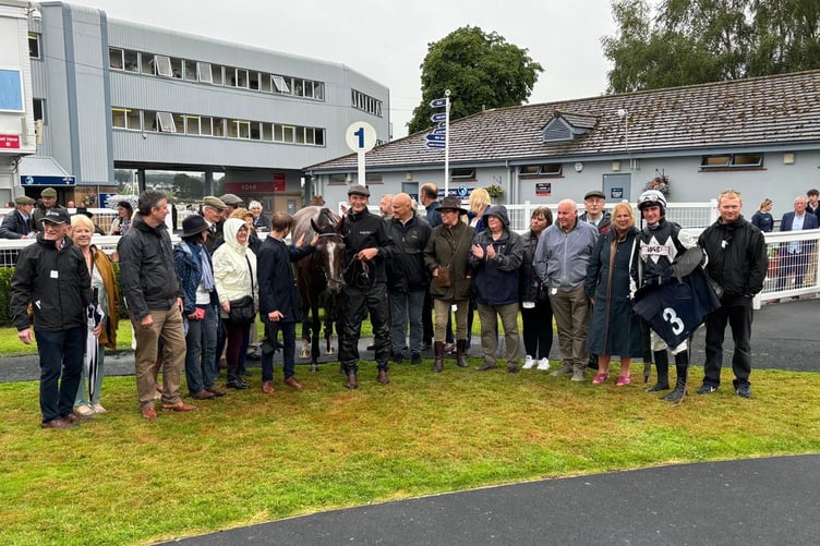 Only Fools in the winners enclosure with members of the David Pipe Racing Club