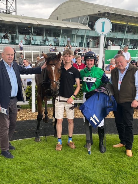 Hammer Dan in the winners enclosure at Stratford with owners John White (left) and Sean Finn (right) along with Stan Dixon leading and jockey Jack Tudor.