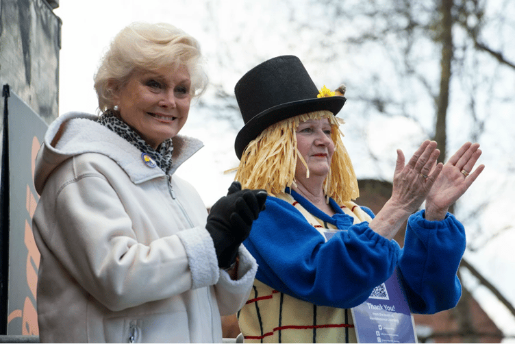 Reminiscence Learning patron Angela Rippon with charity chief executive Fiona Mahoney in 'Archie' costume.