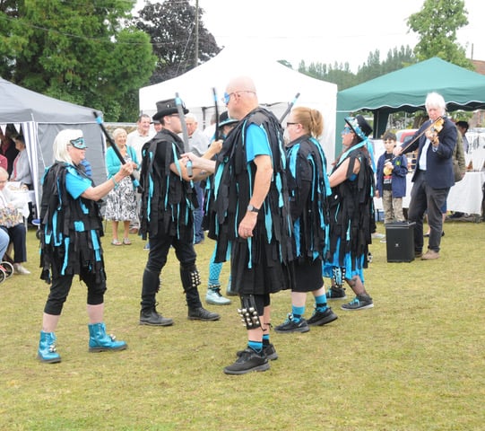 The Enigma morris dancers entertained at the fete and flower show