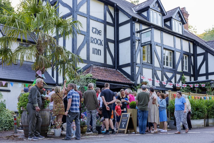 Guests at the reopening of the Rock Inn, water row, near Wiveliscombe.