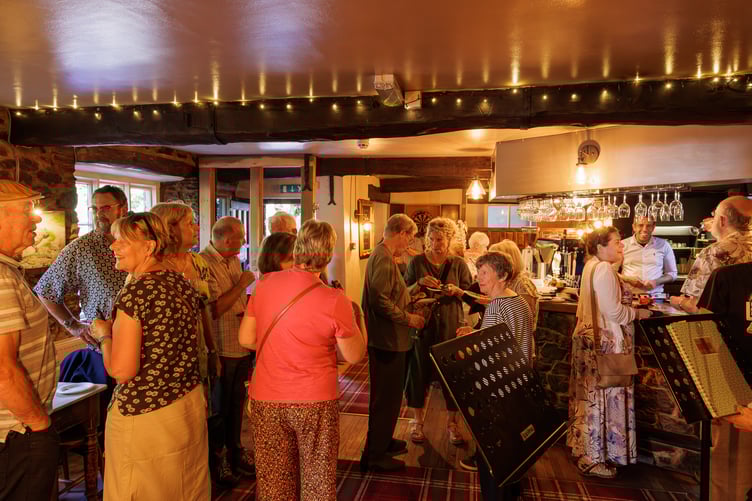 Some of the guests attending the reopening of The Rock Inn, Waterrow, near Wiveliscombe. PHOTO:Carlos Farinha.