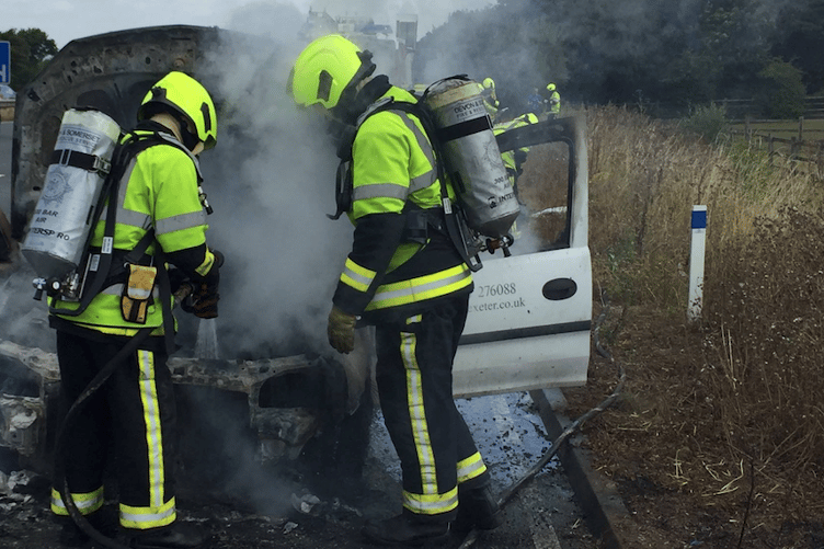 A Devon and Somerset Fire and Rescue crew at a previous car fire. PHOTO: DSFR.