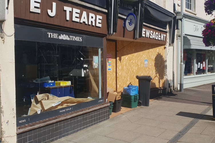 The empty newsagent's shop at the centre of a conservation area row in Wellington.