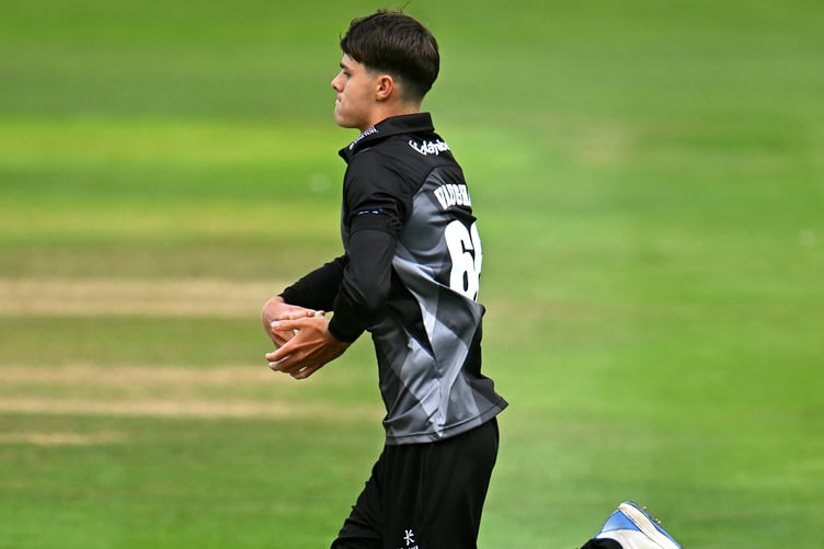 Vaughan bowls against Kent on his debut