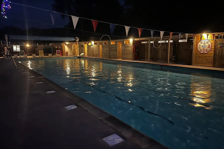 Wivey Pool, Wiveliscombe, pictured at night when 'Dimpsy Dip' swimming by moonlight is available.