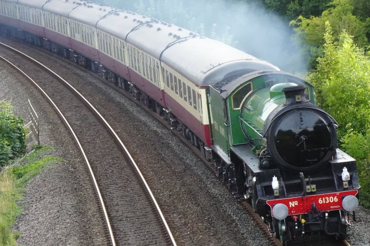 Steam engine No. 61306 Mayflower hauls an excursion on the White Ball Bank near Sampford Arundel at the weekend.