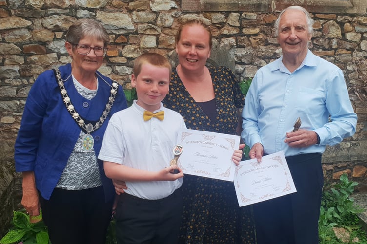 Wellington Town Council community awards were presented this year to Beech Grove School pupil Alex Potter and community centre chairman Dave Mitton, who are pictured with Mayor Cllr Janet Lloyd and Alex's mum Abby.