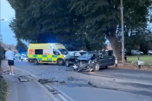 An ambulance attends the scene of a three-car crash in Longforth Road, Wellington, at the weekend.