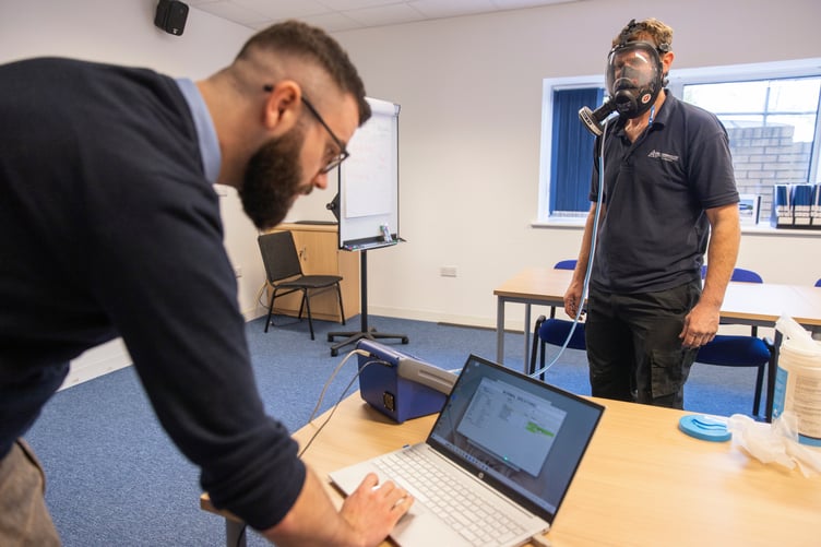 A face mask is tested by Wellington firm G&L Consultancy to determine if it provides an adequate seal.