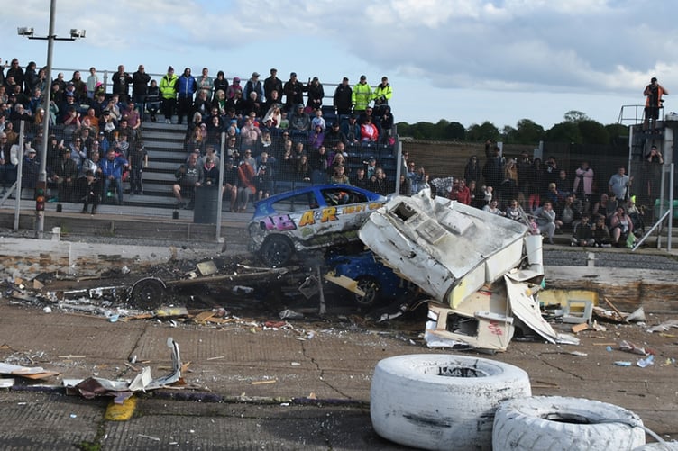 Corey Karkeek shot over the top of Shane Kennard in the last caravan chaos race
