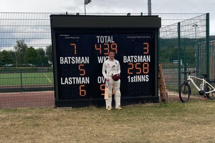 Frome's Donald Corbett in front of the scoreboard