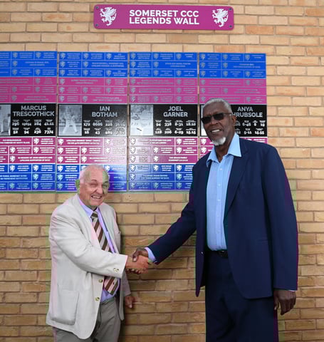 Joel Garner, all 6 ft 8in of him, with cricket correspondent Richard Walsh.