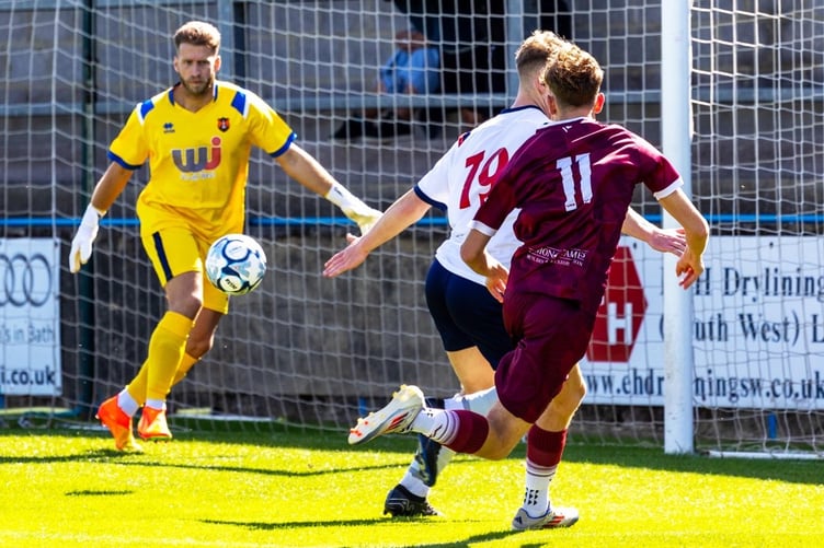 Wellington goalkeeper Jake Viney denies Paulton on this occasion