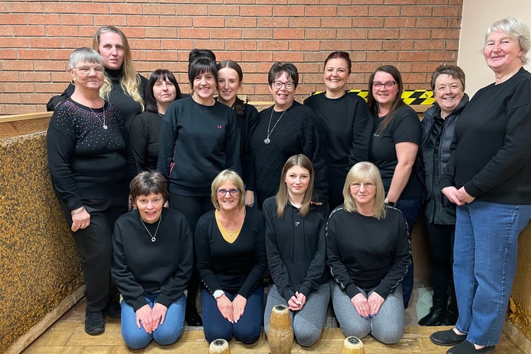 Jolly Blues, kneeling left to right: Annie Shire, Cathy Sharland, stricker up Chloe Powell, Sue Jarman; standing: Violet Bowden, Lisa Manning, Amanda Moysey, Ali Campbell, Dan Campbell, Sharon Frost, Katie Jordan, Shellie Jarman, Dawn Ngakane, Sandra Wood.