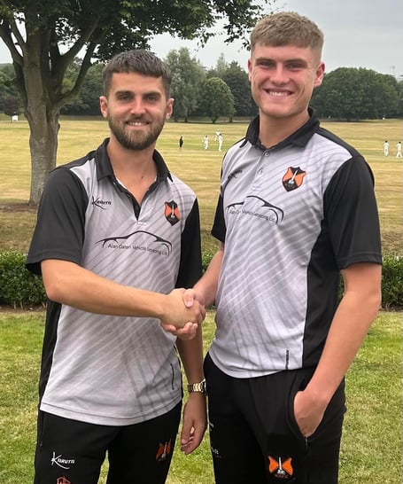 Wellington Reserves' Man of the Match Charlie Hawkings with skipper Tom Davies