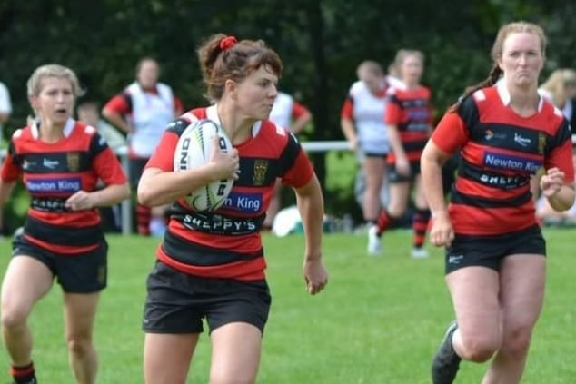 Violet Coppin on her way to scoring a try for Wellington Vixens