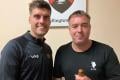 Wellington's Man of the Match Sam Sheldrake, sponsored by Stingz Sportswear, receives his award from youth coach
Steve Trevelyan,