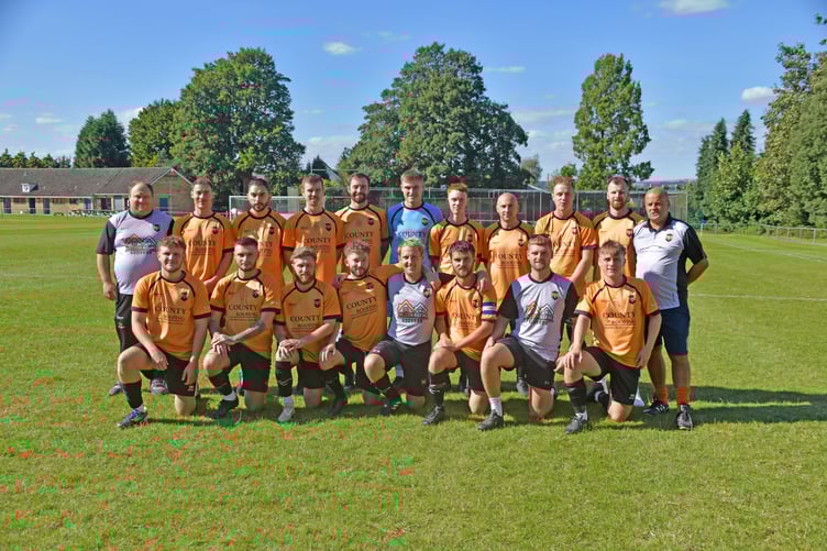Wellington Reserves, pictured recently, back left to right:
Adrian Ridgeway (kit man) Oli Nott, Connor Noble, Sam Bryant, Jackson Bryant, Charlie Hawkings, Chesney Brown, Jim Pocock, Alfie Jo-Small, Luke Perry, Mike Owen (joint manager); front:Sam Poole, Aaron Hawkings, Scott Merritt, Wes Poulsom, Mark Owen (Player Manager) Tom Davies, Tom Hawkings (assistant kit man) Dylan Groves