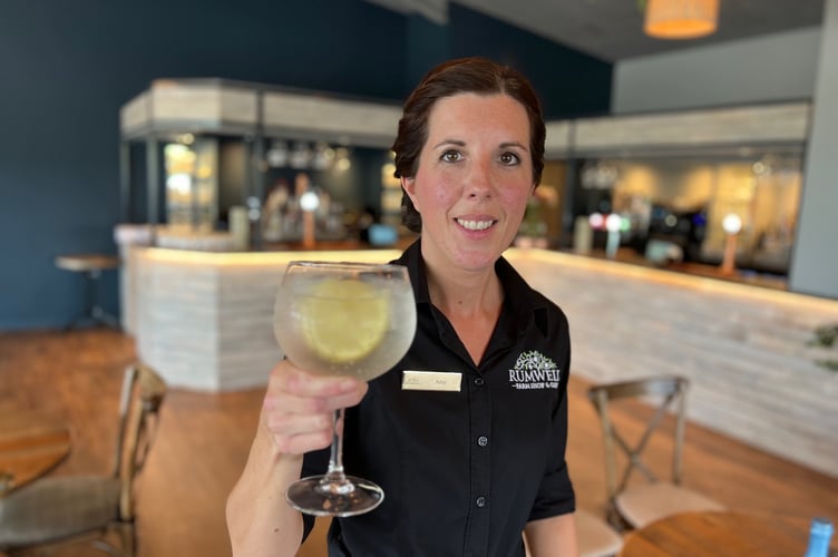 Amy Clare from Rumwell Farm Shop & Café’s waiting team helping get prepared for the Gin & Fizz Night