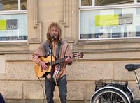 Busking Joseph returns to high street to “get the fire burning again”
