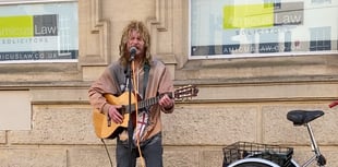 Busking Joseph returns to high street to “get the fire burning again”