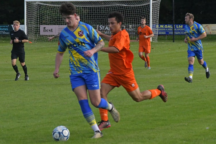 Action from Wellington's home game against Paulton Rovers last weekend