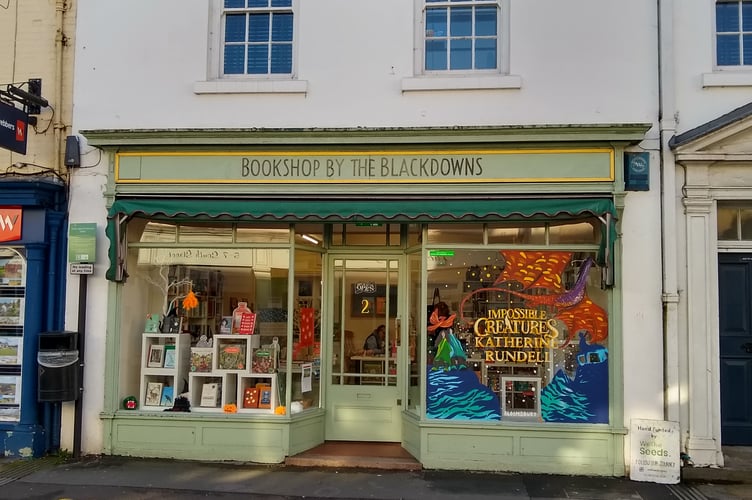 Bookshop by the Blackdowns has won a Bloomsbury sponsored prize-draw to have their shop window hand painted by the creative arts agency, We the Seeds.