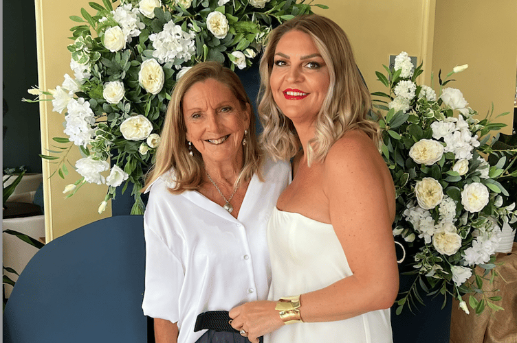 Faye Clarke and her mum celebrating Faye's first award for her work with Lara Belle Bridal Boutique last year - Faye will take part in next year’s AJ Bell North Great Run half marathon to raise money for Breast Cancer Now.