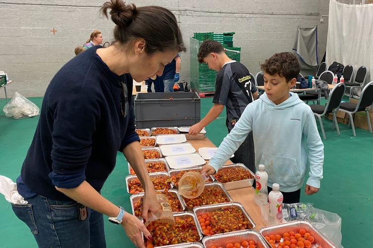     Wellington School students, staff and family members working hard to package 60,000 meals in 24 hours