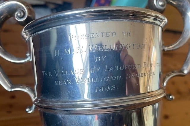 Information is being sought about this cup presented by Langford Budville to HMS Wellington in 1942.