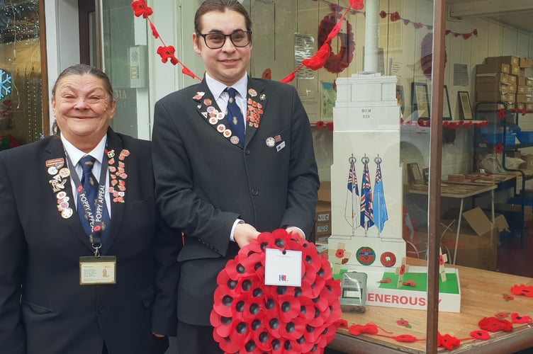 Wellington Poppy Appeal organiser Linda Trickey and Royal British Legion branch secretary Scott Godwin at the town's Pop Up Shop.