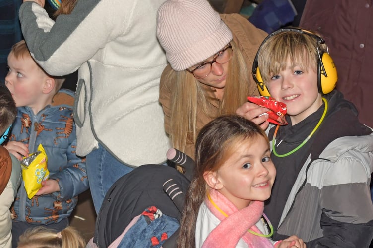 Mum Natalie with Isla and Reggie getting ready for the firework display