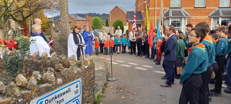 An act of Remembrance at Hemyock war memorial on Sunday. PHOTO: Janice Bawler.