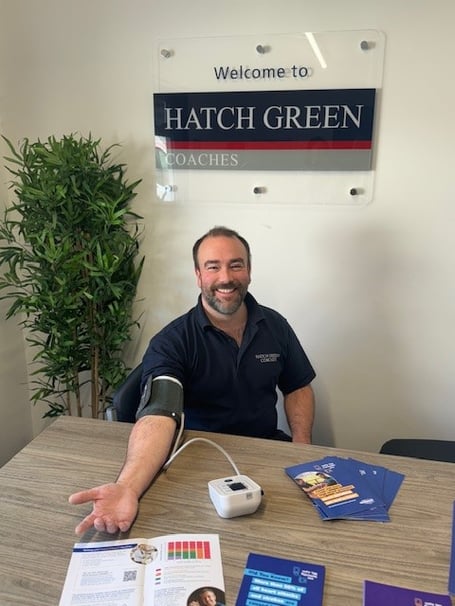Joshua Strickland, operations director at Hatch Green Coaches, having his blood pressure taken
