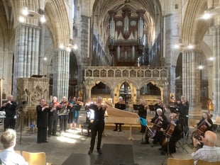 Baroque orchestra returning to village