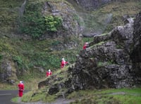 Santas abseil Cheddar Gorge for charity