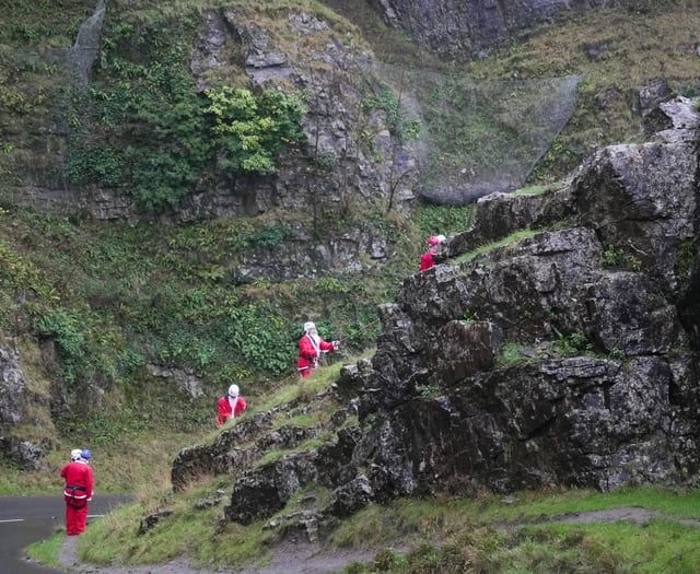 Santas abseil Cheddar Gorge for charity