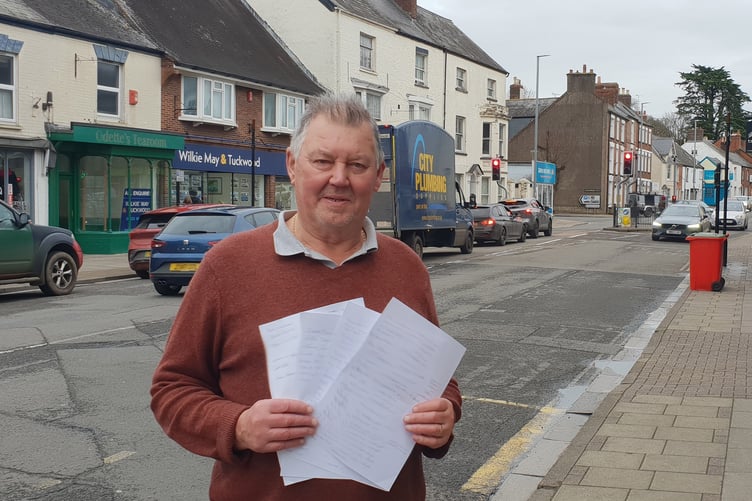 Wellington resident Tony Gibson with a petition against new housing proposals in Tonedale.