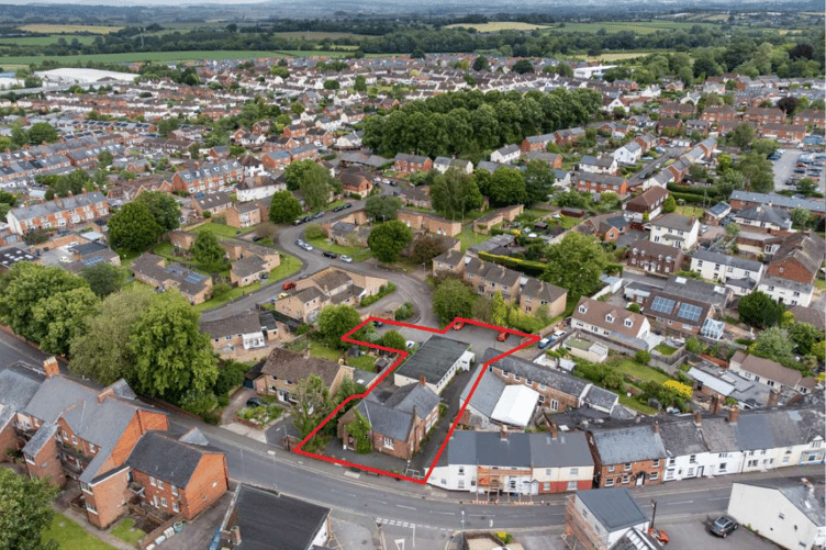 An aerial view of the North Street, Wellington, site (outlined in red) which Somerset Council is trying to sell at auction. PHOTO: GTH.