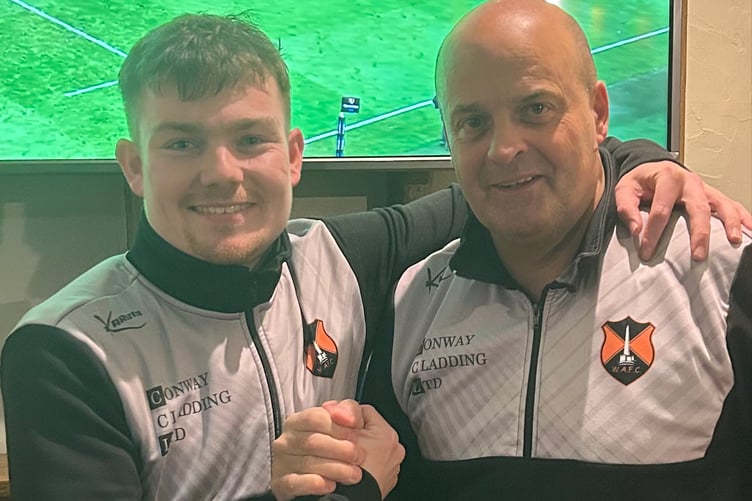 Two-goal Ben Evett was the Reserves' Man of the Match and is pictured with assistant manager Michael Owen.