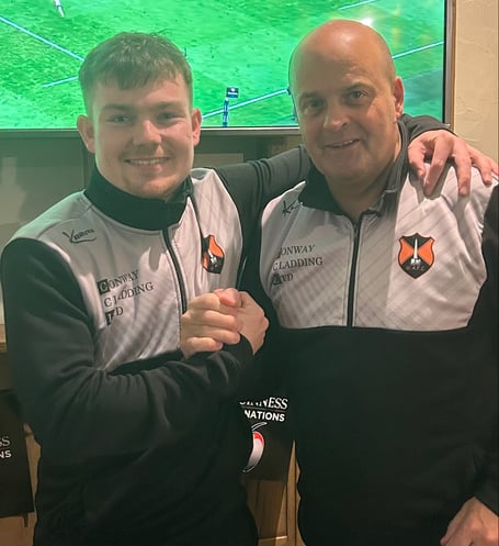 Two-goal Ben Evett was the Reserves' Man of the Match and is pictured with assistant manager Michael Owen.
