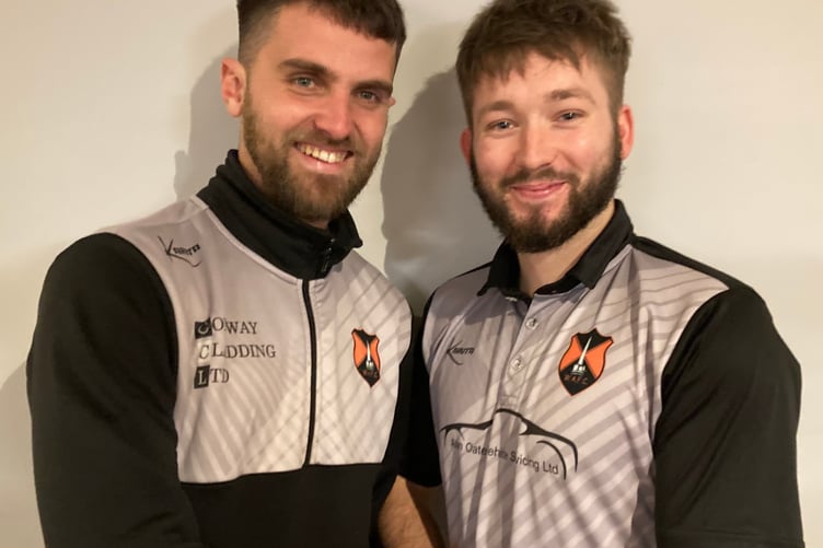 Wes Poulsom was Man of the Match for Wellington Reserves against Colyton and is pictured being congratulated by skipper Tom Davies on behalf of match sponsors JAB Electrical Supplies.
