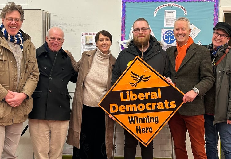Liam Pollard is pictured, third from right, with Gideon Amos and other supporters.