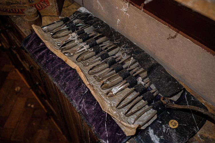 Inside the W.C.White Victorian Chemist time capsule display at Flambards, Cornwall. See SWNS story SWLNpharmacy. A Somerset pharmacy which was boarded up in the early 1900s remains almost exactly the same more than 100 years later - only now, it's in Cornwall.  The Victorian time capsule in South Petherton was discovered in the 1980s when the shop's then-owner Margaret White died. The shop had been shut since 1971, when Margaret had decided to close it rather than convert to using decimal coins. When the auctioneer went to have a look around in 1987, they discovered the back half of the shop was entirely sealed off.