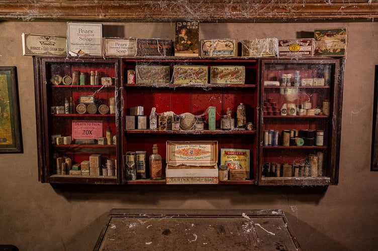 Inside the W.C.White Victorian Chemist time capsule display at Flambards, Cornwall. See SWNS story SWLNpharmacy. A Somerset pharmacy which was boarded up in the early 1900s remains almost exactly the same more than 100 years later - only now, it's in Cornwall.  The Victorian time capsule in South Petherton was discovered in the 1980s when the shop's then-owner Margaret White died. The shop had been shut since 1971, when Margaret had decided to close it rather than convert to using decimal coins. When the auctioneer went to have a look around in 1987, they discovered the back half of the shop was entirely sealed off.