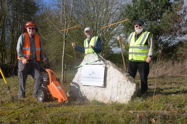 Milverton Conservation Volunteer Group cutting and clearing vegetation for their weekend activity