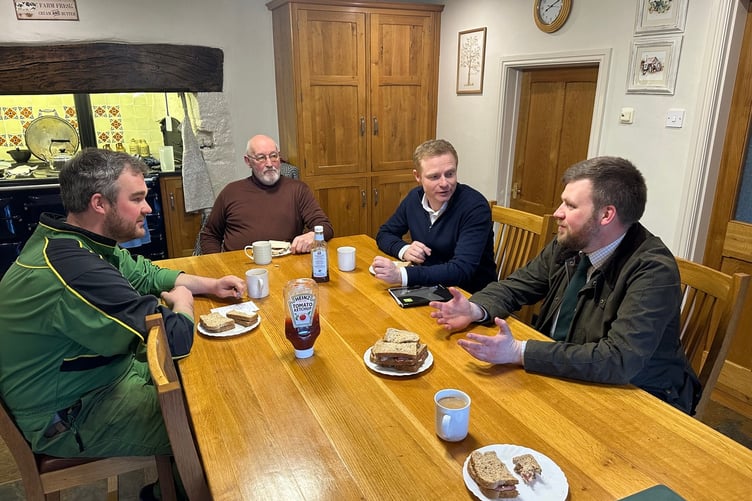Around the farmhouse kitchen table are (left to right) farmers Luke and David Partridge, Shadow Farming Minister Robbie Moore, and Exmoor farmer and campaigner James Wright.