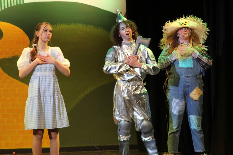 Dorothy, the Tin Man and the Scarecrow in The Wizard of Oz