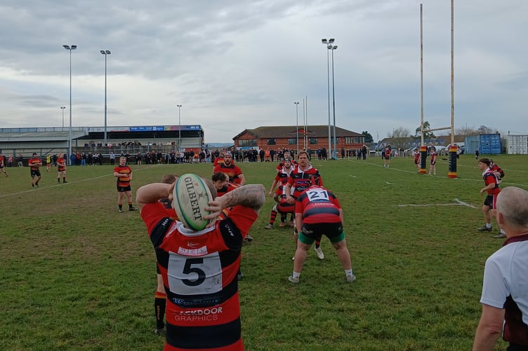 Wellington 2nd XV skipper Andrew Bellamy throws in at a line-out
